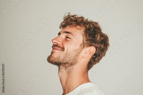 A close up of a man's face with her eyes closed