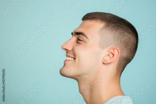 A close up of a man's face with her eyes closed