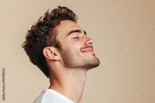 A close up of a man's face with his eyes closed