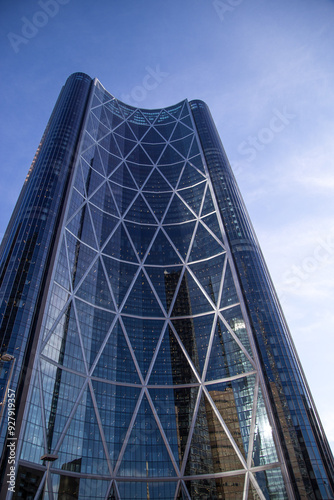 modern blue skyscraper in city