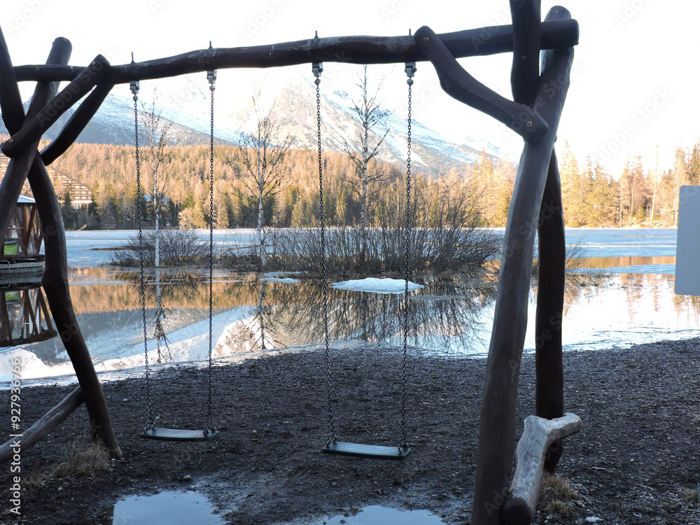 Fototapeta premium Swing at Štrbské Pleso in the High Tatras in romantic time.