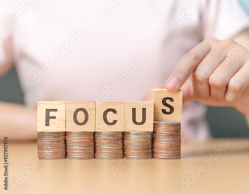 Focus management concept. hand put focus word on wooden block cube