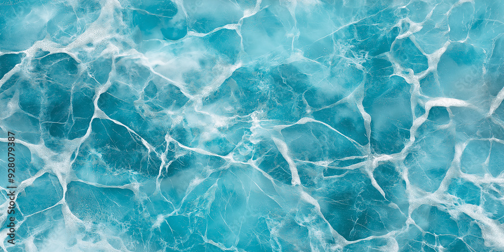 Obraz premium Turquoise blue water surface with white foam is creating abstract pattern
