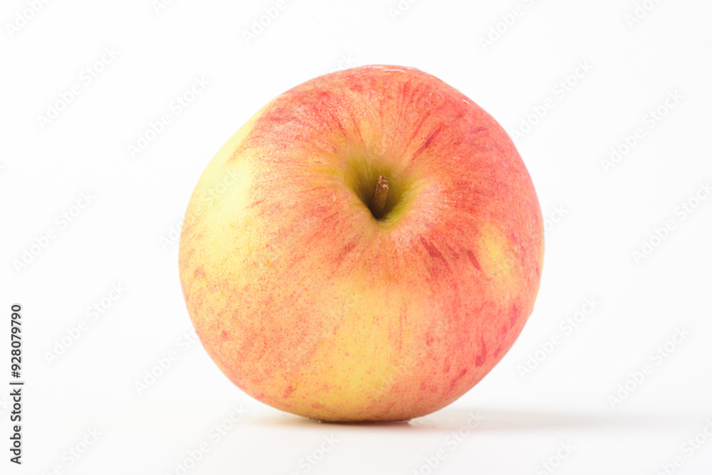 Fresh ripe apple with tiny water drops on white background Fresh ripe apple with tiny water drops on white background