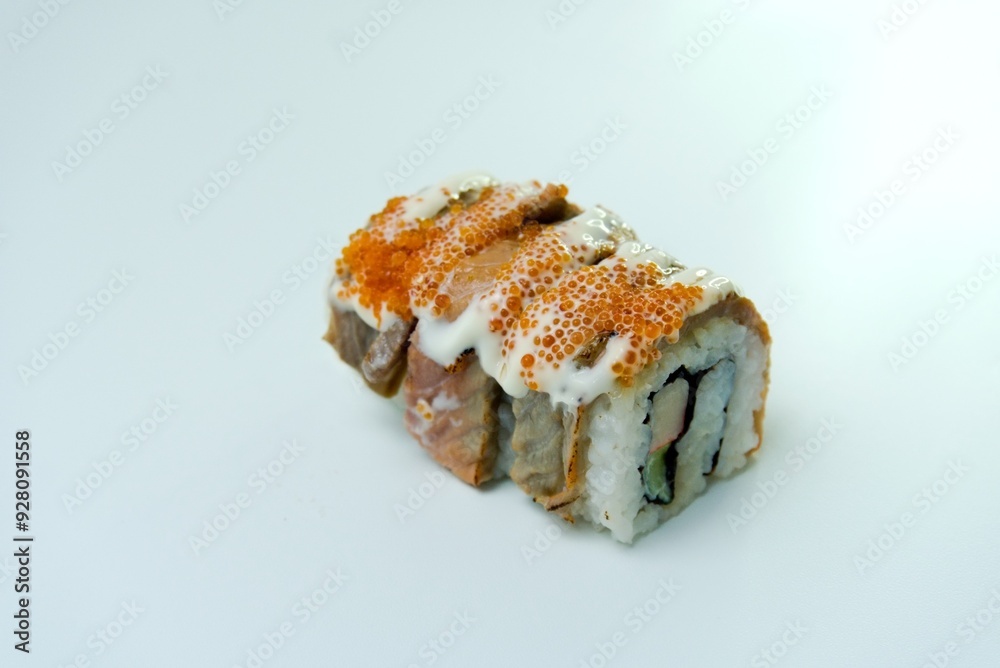 sushi roll with a drizzle of mayo sauce mix egg fish sushi roll with a drizzle of mayo sauce mix egg fish