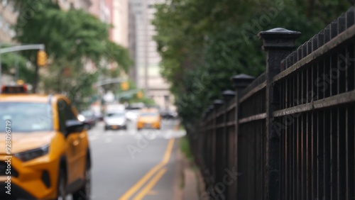 New York City Park Avenue. Grand Central Terminal railway station on 42 street. Manhattan Midtown. Yellow taxi cab in NYC, USA. American urban road car traffic, transport in United States. Defocused.