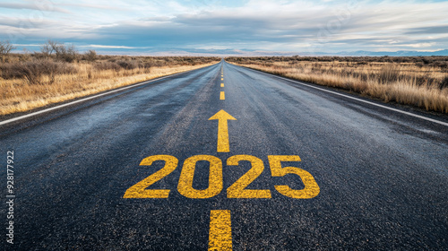 Road to 2025 with an empty road with written 2025 and arrow pointing towards the horizon to represent the future and positivity and success of the new year 2025