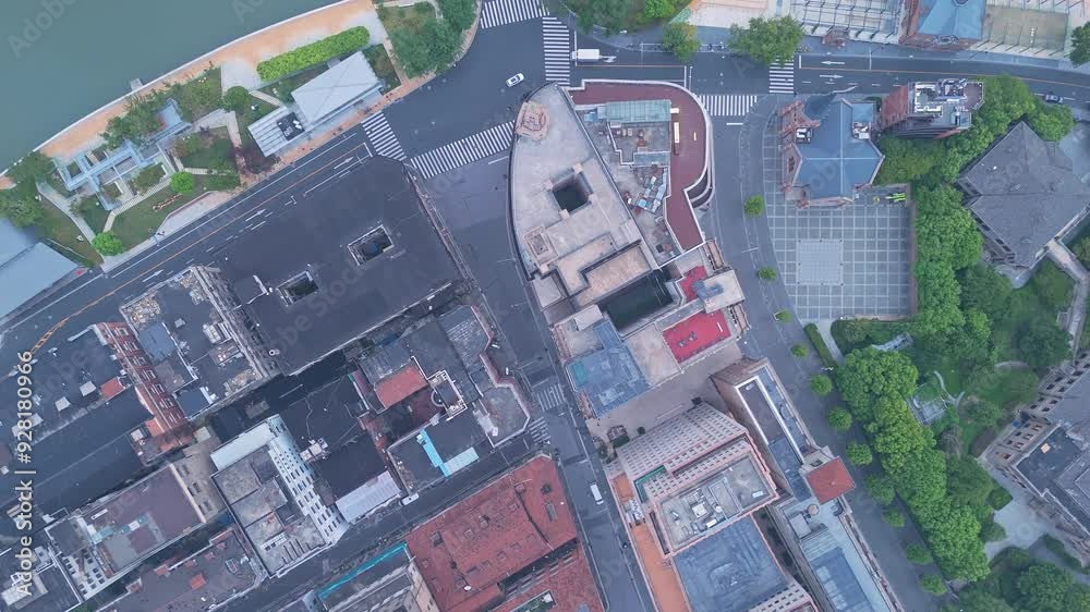 Shanghai, China - August 12th 2024: 4K real time Aerial view of modern commercial office buildings and skyline in the fog at sunrise Shanghai, China - August 12th 2024: 4K real time Aerial view of modern commercial office buildings and skyline in the fog at sunrise