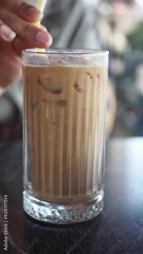 iced late in a transparent glass on cafe table iced late in a transparent glass on cafe table
