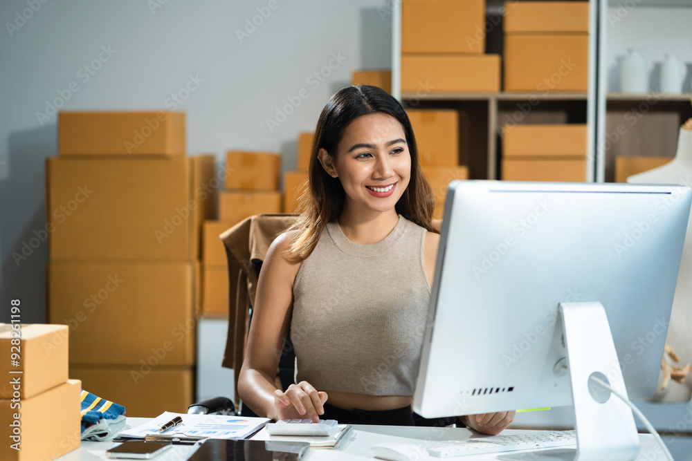 Successful Woman online seller. small business entrepreneur SME or Asian woman working freelance with online sell at home.