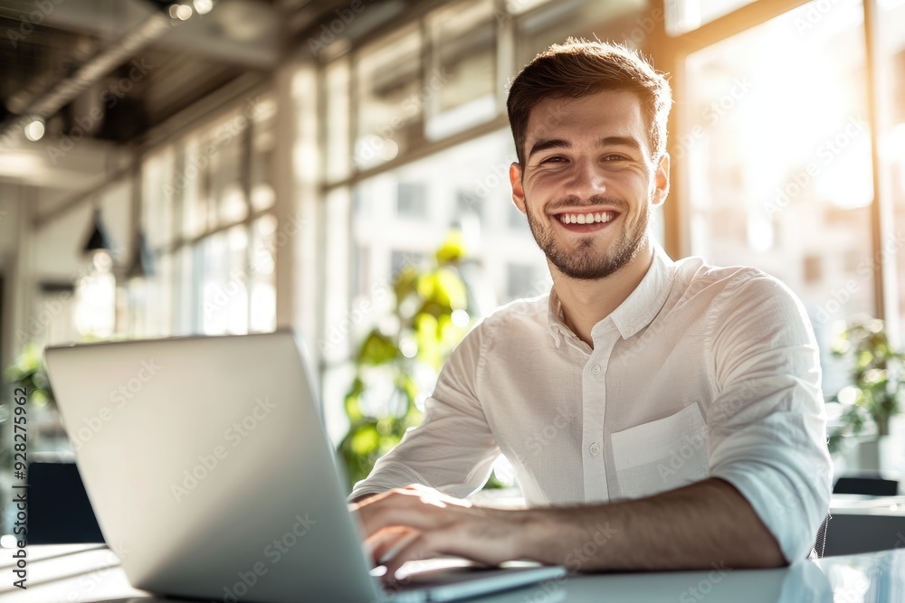 High-resolution brightly lit photorealistic candid photograph of a young marketer smiling while working on his laptop in a sleek, sun-drenched office space. The photograph is styled like a high-end High-resolution brightly lit photorealistic candid photograph of a young marketer smiling while working on his laptop in a sleek, sun-drenched office space. The photograph is styled like a high-end