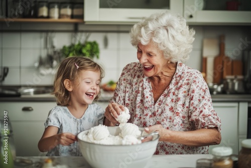 High-resolution brightly lit photorealistic candid photograph of a grandmother and grandchild making homemade ice cream in a kitchen, laughing and sharing the experience. The photograph is styled