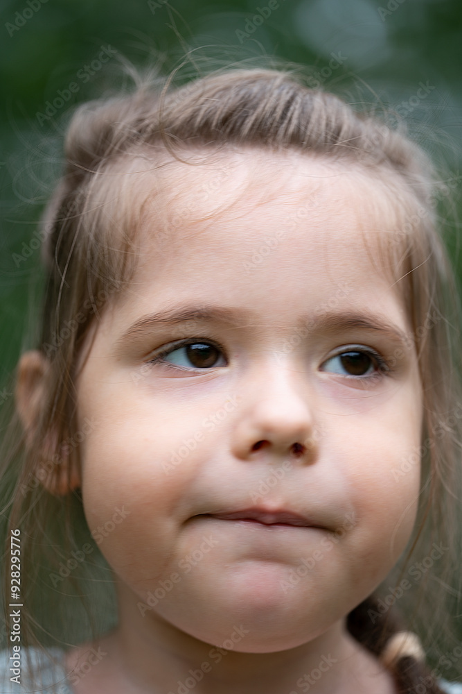 Portrait of a three-year-old brunette girl with brown eyes Portrait of a three-year-old brunette girl with brown eyes