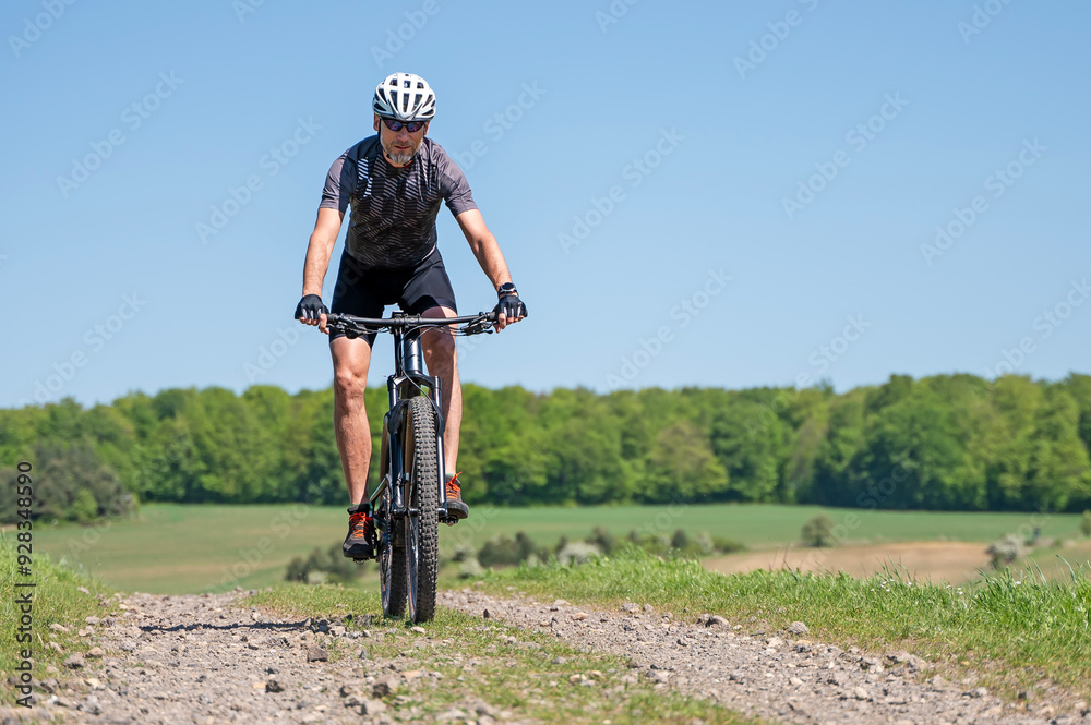 Man on a mountain bike.