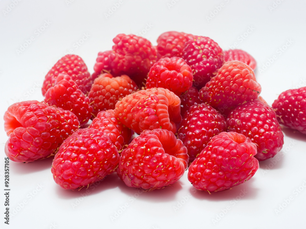 Fresh organic raspberries on white background Fresh organic raspberries on white background