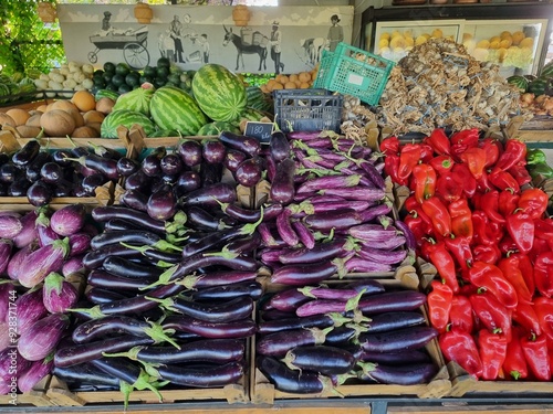 fruits in kiosk autun season grapes tomatoes plums lemons cherries vegetables photo