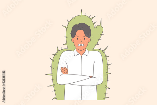 Nervous man experiences aggression and rage due to bad mood, stands in cactus cocoon