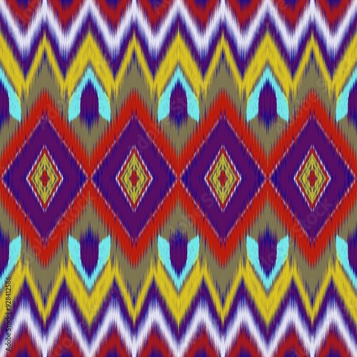 Colorful ikat pattern in vintage style. Elegant ethnic background. Hand drawn oriental art. Seamless geometric vintage texture