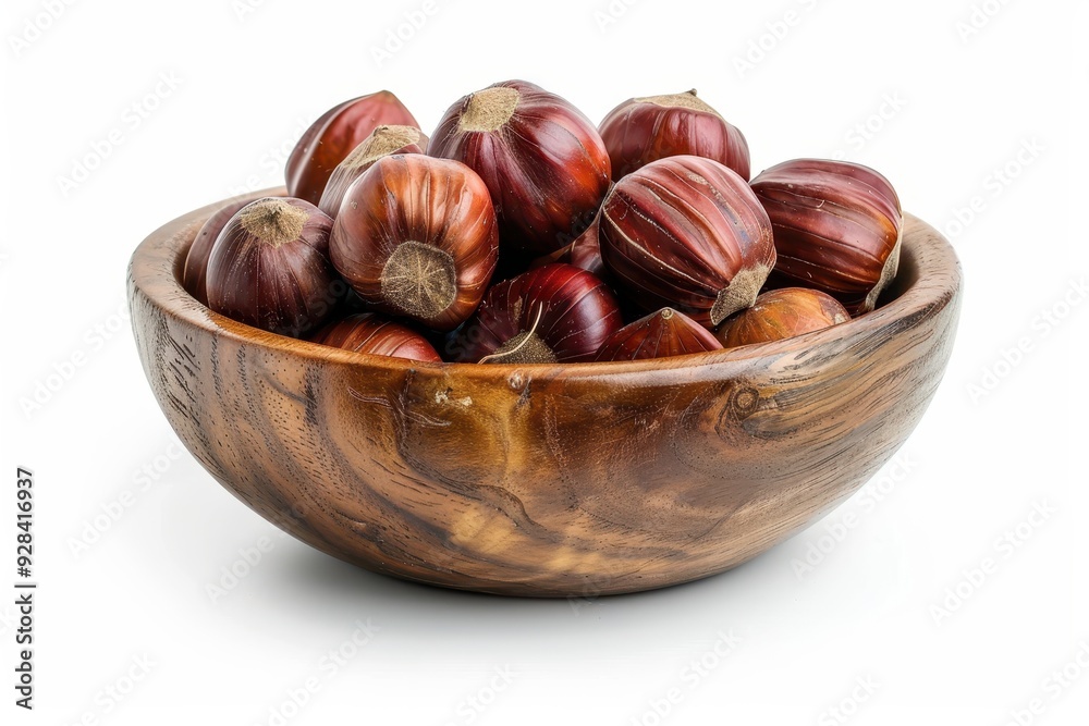 Horse chestnuts in bowl on white background Horse chestnuts in bowl on white background