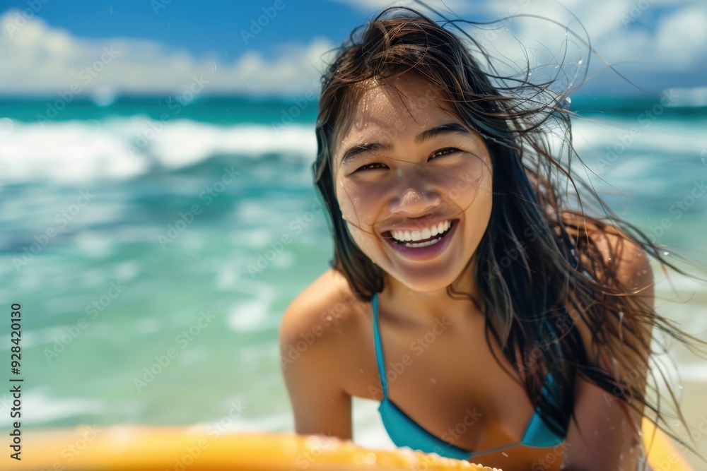 Portrait of a happy surfer woman enjoying Waikiki Beach in Hawaii Bikini girl laughing while surfing living a healthy lifestyle in Hawaii Model is of Asi Portrait of a happy surfer woman enjoying Waikiki Beach in Hawaii Bikini girl laughing while surfing living a healthy lifestyle in Hawaii Model is of Asi