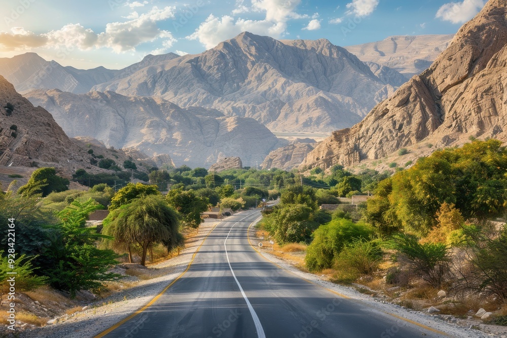 Rural desert scenery with a road through villages near mountains in the Middle East Rural desert scenery with a road through villages near mountains in the Middle East
