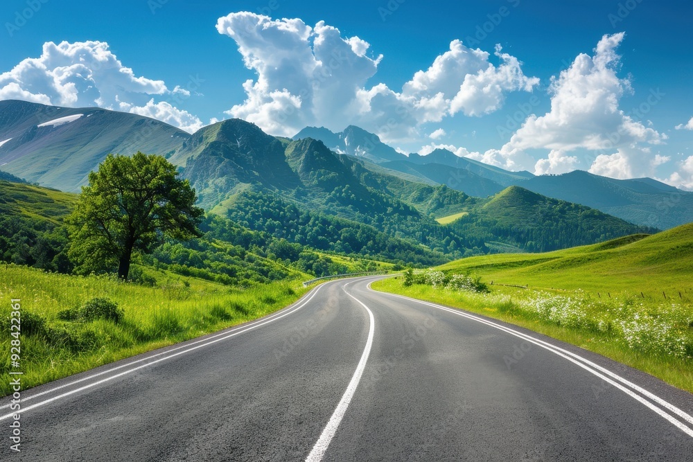 Naklejka premium Rural highway with scenic mountains landscape