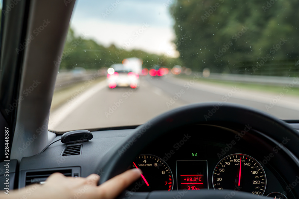 View of the motorway from inside the car while driving along the road. View of the motorway from inside the car while driving along the road.