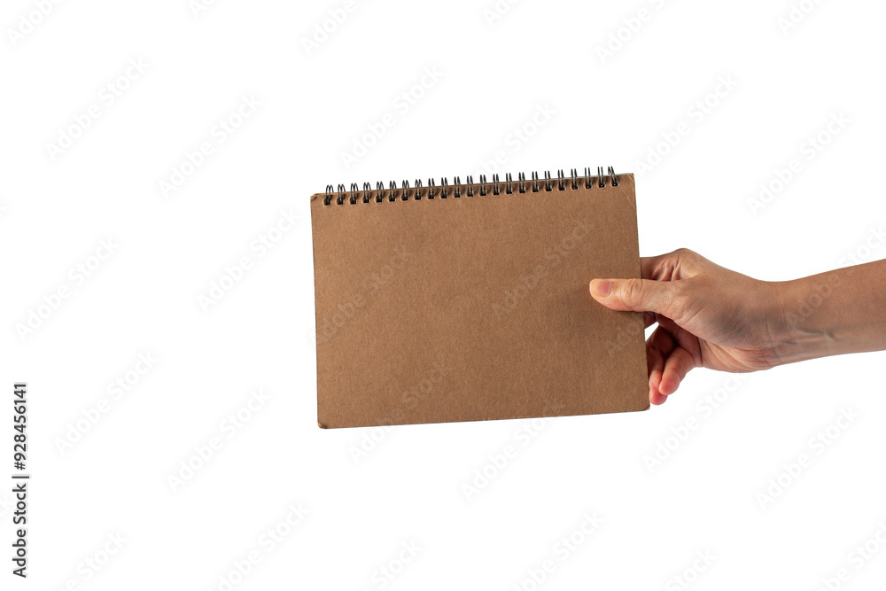 Brown notebook in hand on transparent background Brown notebook in hand on transparent background