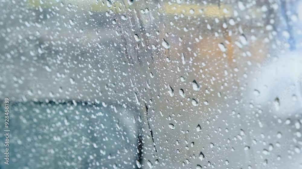 real rain drops sliding on window car glass, close view real rain drops sliding on window car glass, close view