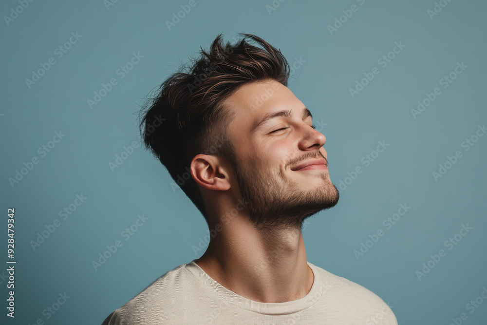 A close up of a man's face with his eyes closed
