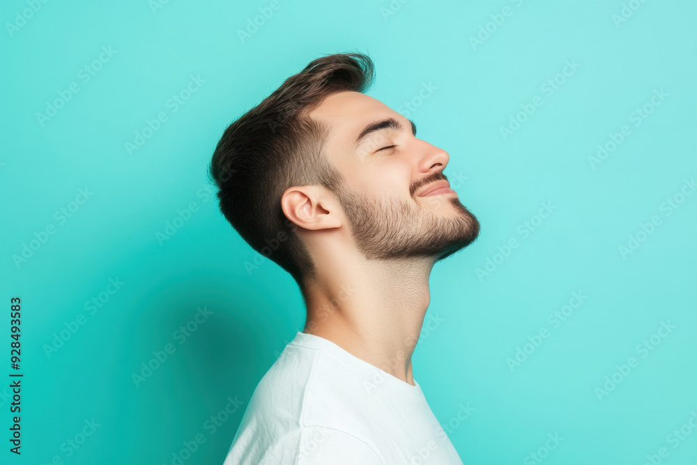 Fototapeta premium A close up of a man's face with his eyes closed