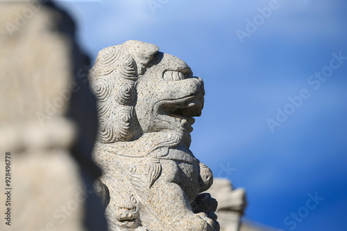 The stone lion on the ancient bridge photo