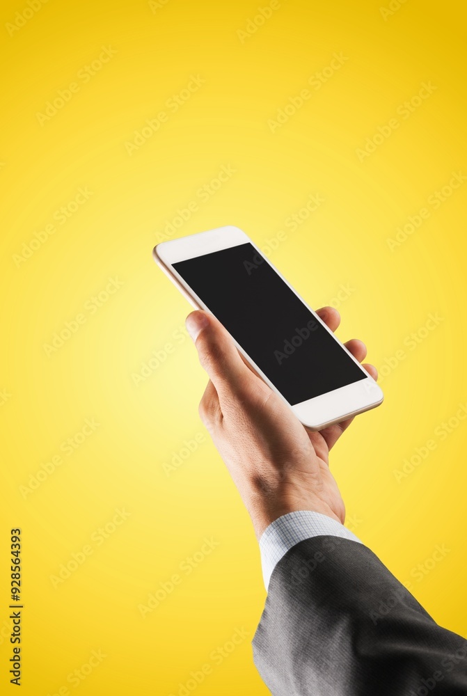 Human hand holding smart phone with a blank screen Human hand holding smart phone with a blank screen