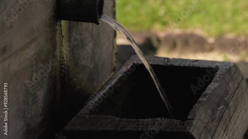 A water fountain off the main street of Narai Juku that acts as a well or source of water - Close up shot photo