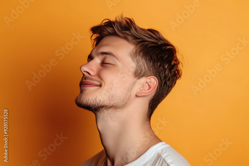 A close up of a man's face with his eyes closed