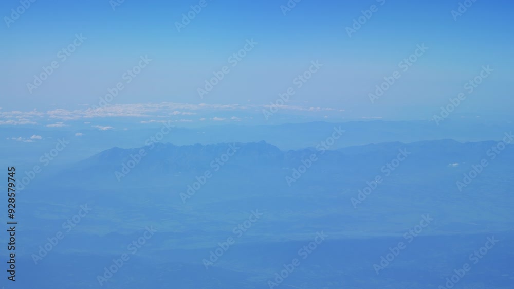 Aerial view of mountain range with slow camera pan in 4k slow motion 60fps Aerial view of mountain range with slow camera pan in 4k slow motion 60fps