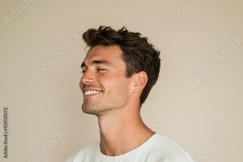 A close up of a man's face with his eyes closed