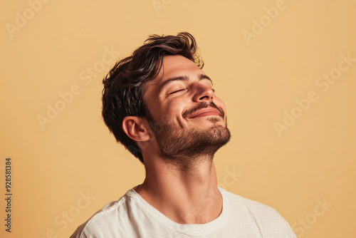 A close up of a man's face with his eyes closed