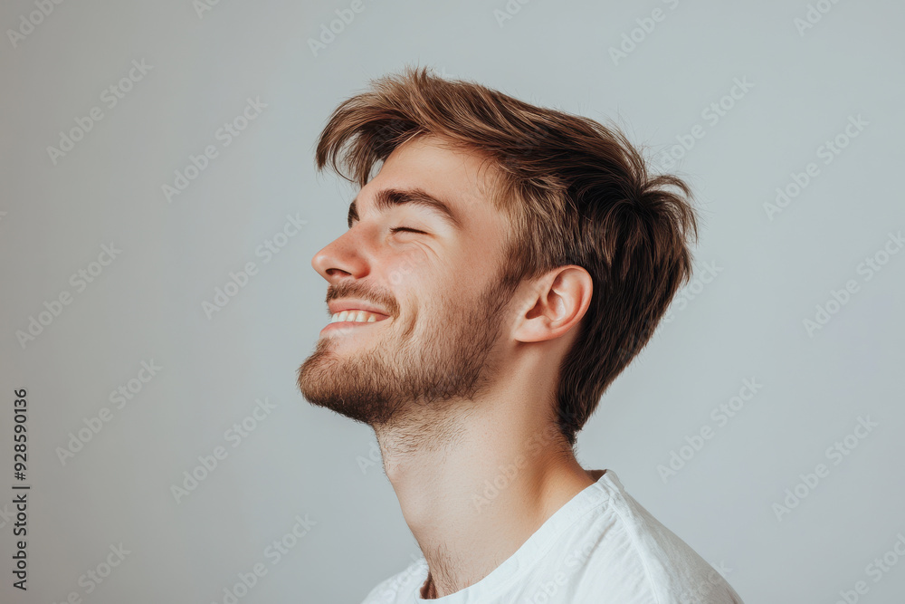 Fototapeta premium A close up of a man's face with his eyes closed
