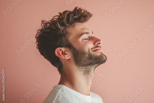 A close up of a man's face with his eyes closed