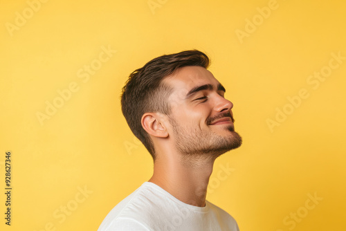 A close up of a man's face with his eyes closed