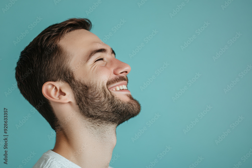 Fototapeta premium A close up of a man's face with his eyes closed