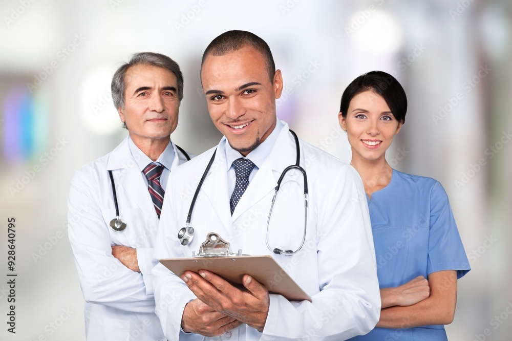 Portrait of doctors team and nurses standing in the hospital. Portrait of doctors team and nurses standing in the hospital.