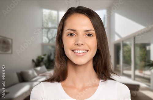 Happy young woman poses playfully