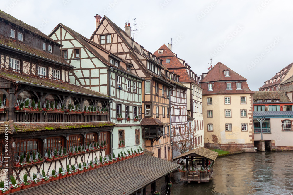 Fototapeta premium Bridges and old buildings on the embankment of the river Ile