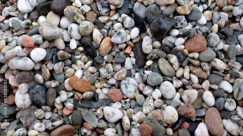 Wet sea stones. Natural sea pebbles closeup. Wet sea stones. Natural sea pebbles closeup.