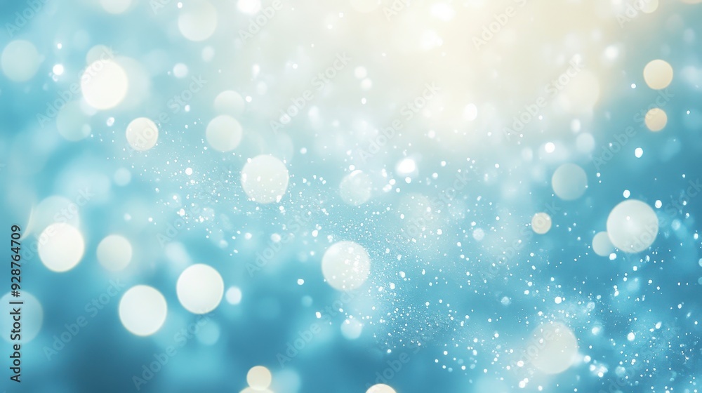 Obraz premium A soft, dreamy background with blurred bokeh lights in shades of blue and white.