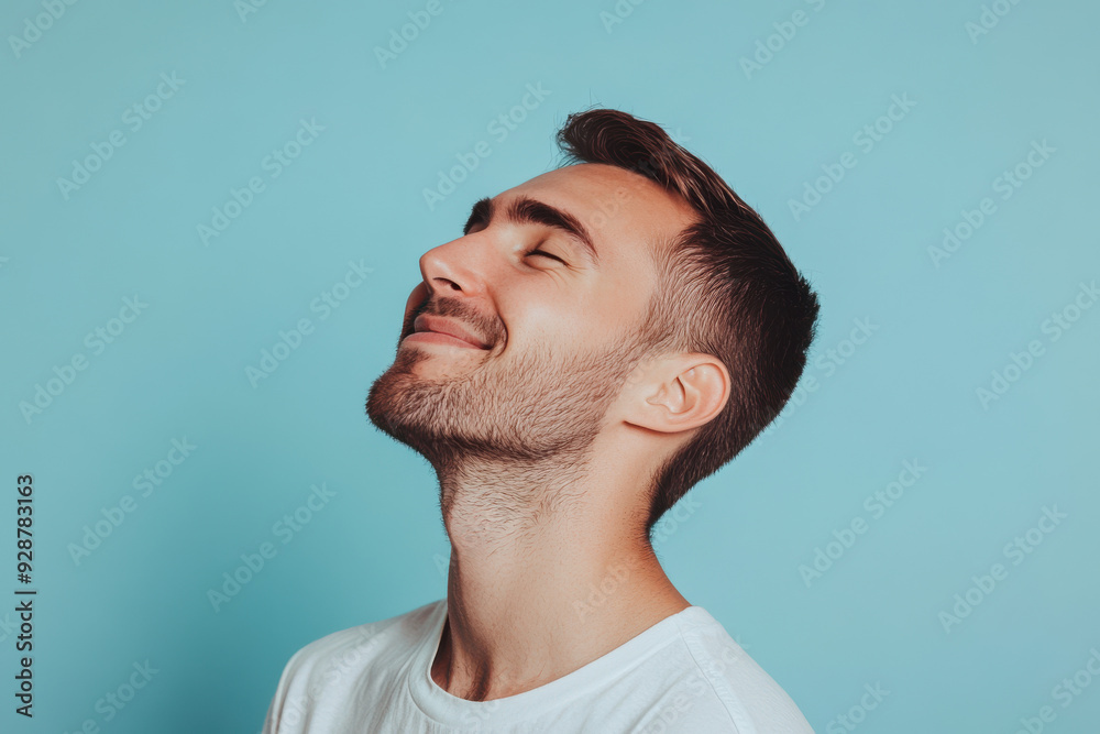 Obraz premium A close up of a man's face with his eyes closed