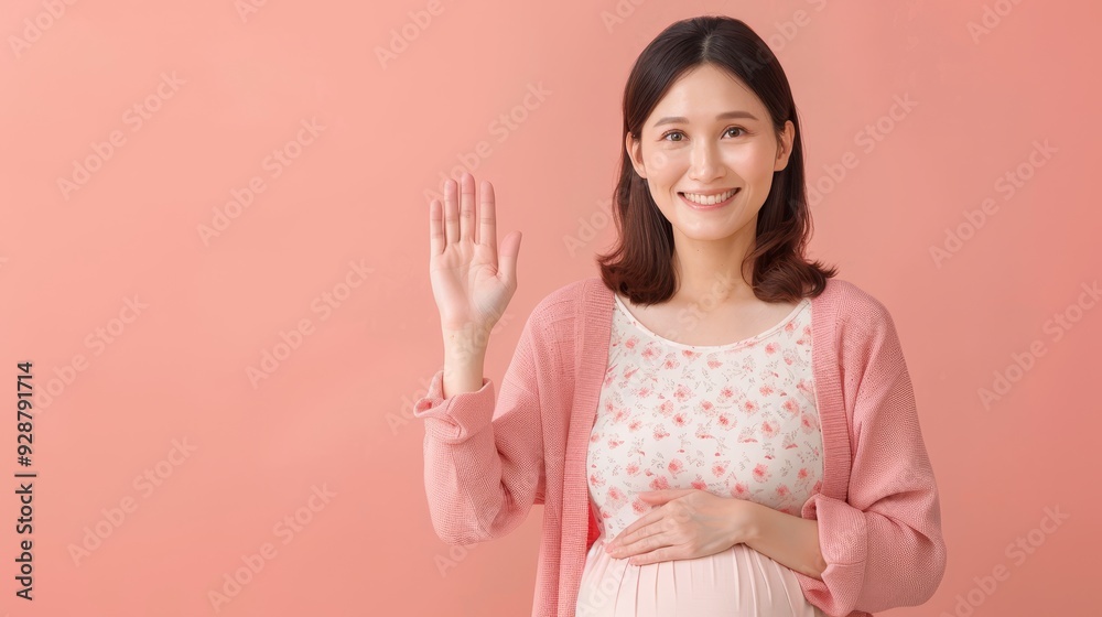 A middleaged pregnant Asian woman standing with on -133 woman, hand, smile, business, people, beauty, person, ok, gesture, looking, sign, up, smiling, finger, businesswoman, face, expression, success A middleaged pregnant Asian woman standing with on -133 woman, hand, smile, business, people, beauty, person, ok, gesture, looking, sign, up, smiling, finger, businesswoman, face, expression, success