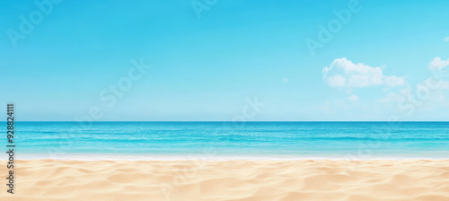 Tropical beach with golden sand, turquoise water, and a bright blue sky. The scene is peaceful and captures the essence of a perfect seaside day.
